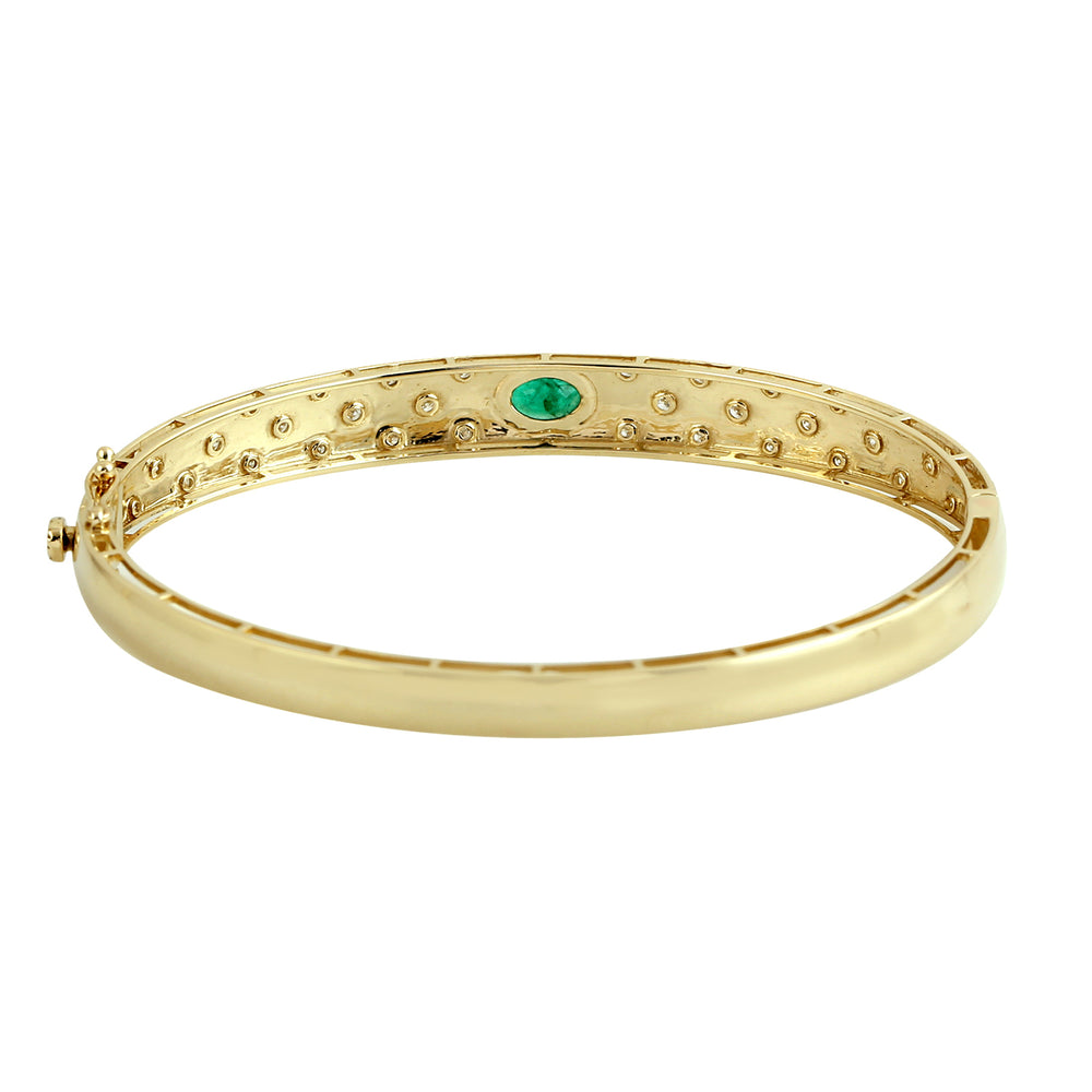 Oval Cut Emerald Bezel Set Diamond Wedding Bangle In 14K Yellow Gold