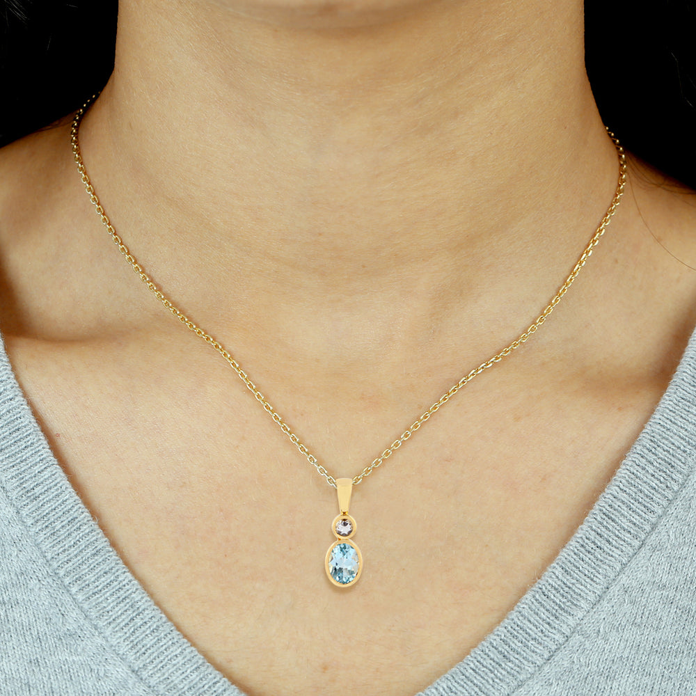 Oval Cut Blue Topaz Round White Sapphire Charm Pendant In Yellow Gold