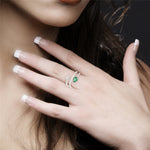 Pear Cut Emerald Baguette Cut Diamond Spiral Design Ring In 18k White Gold