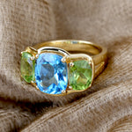 Blue Topaz Cushion Cut Peridot Gemstone Three Stone Ring In Solid Gold