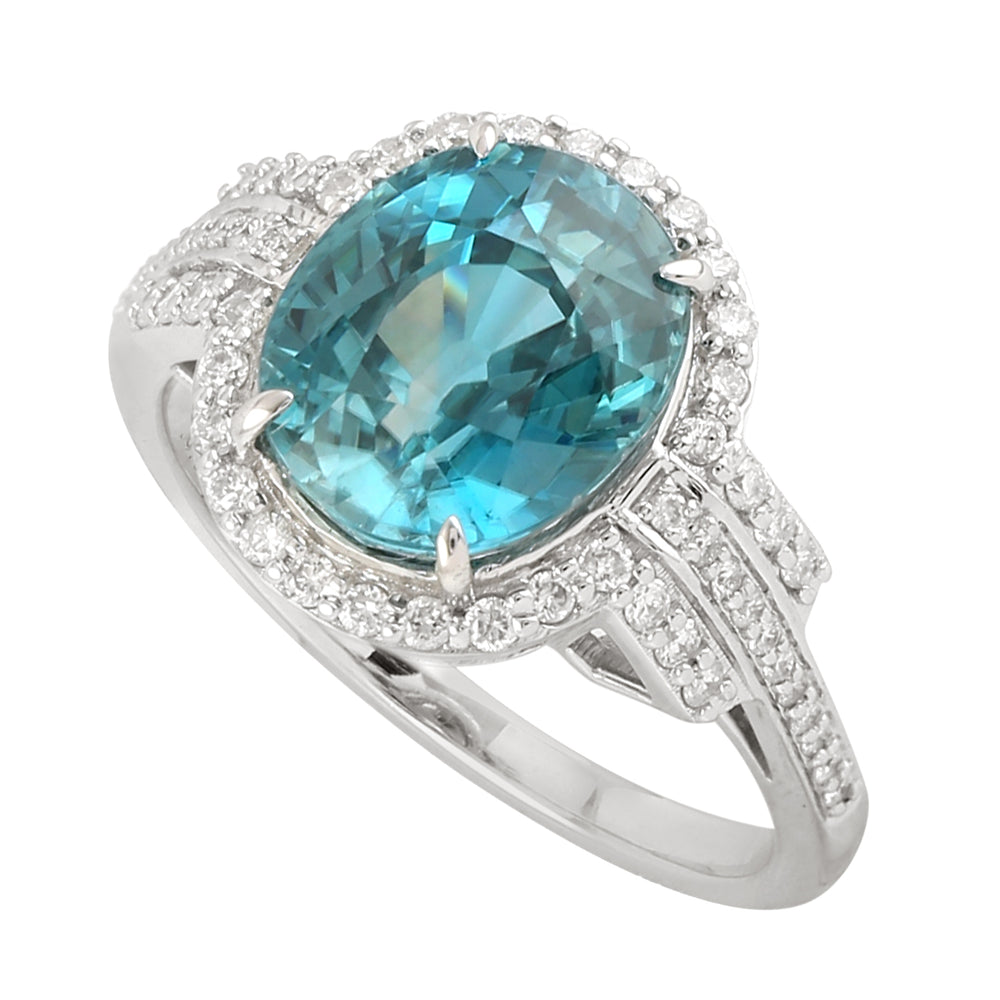 Oval Blue  Zirconia & Diamond Halo Solitaire Ring in 18K White Gold