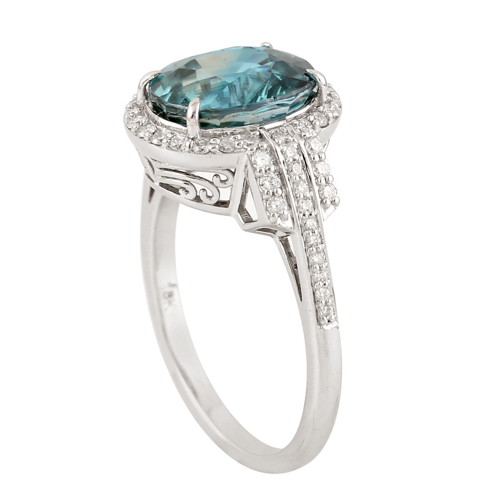 Oval Blue  Zirconia & Diamond Halo Solitaire Ring in 18K White Gold