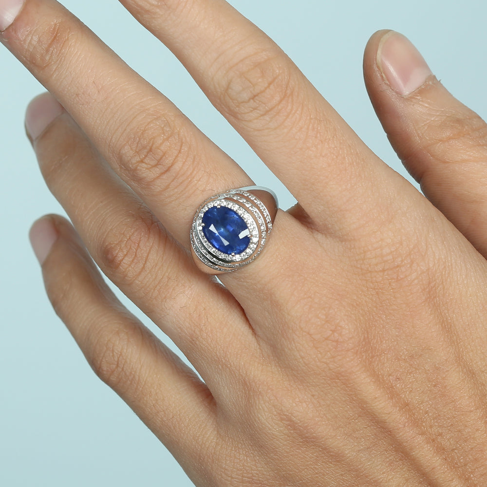 Oval Blue Sapphire & Diamond Halo Ring in 18K White Gold