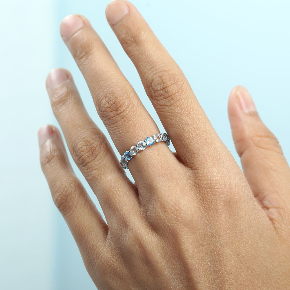 Blue & White Topaz Eternity Band in 18k White Gold