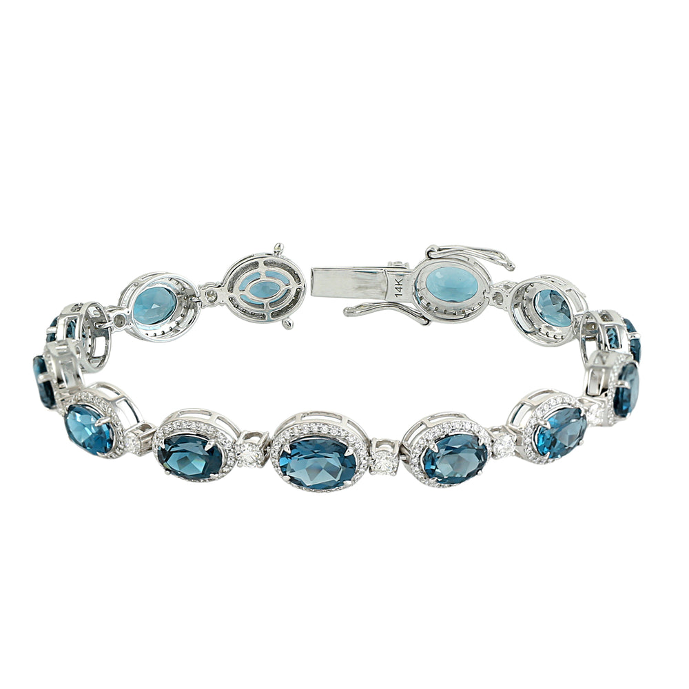 Oval Cut London Blue Topaz Pavé Diamond Fixed and Flexible Bracelet in 14K White Gold