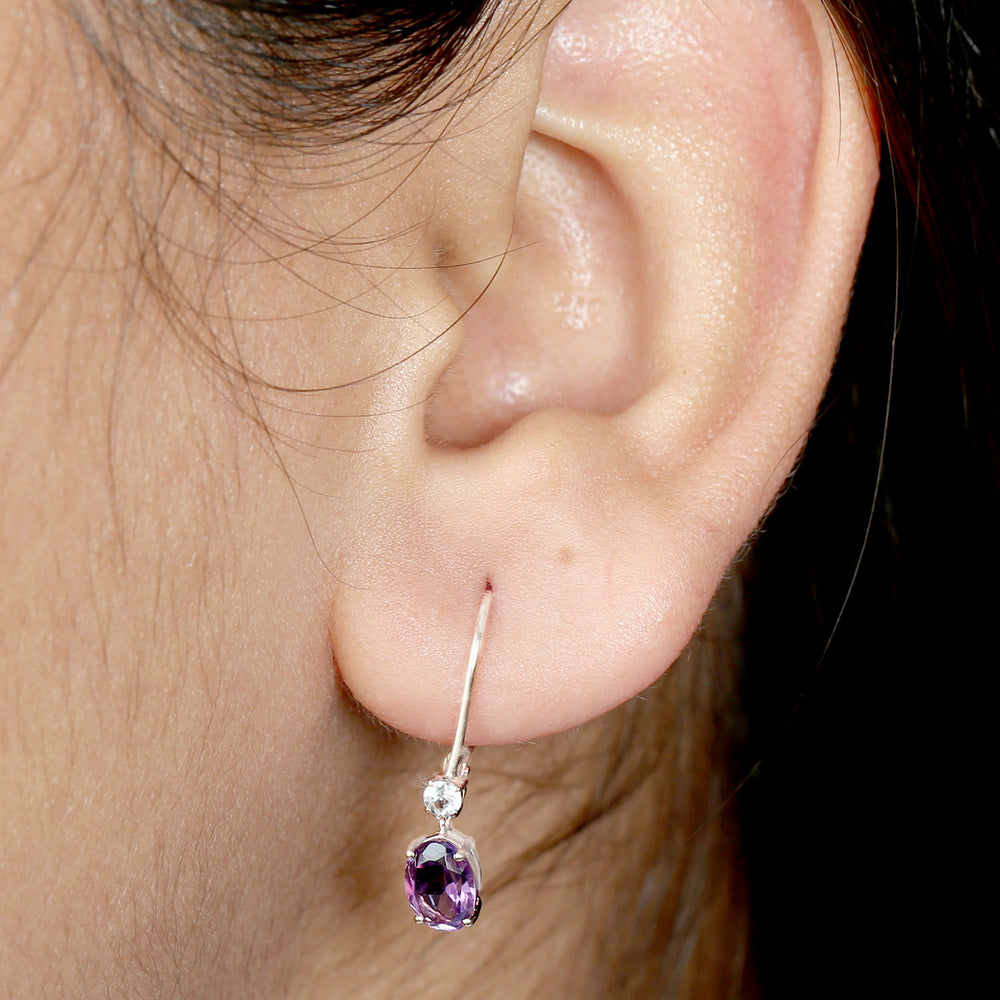 Oval Cut Amethyst Prong Cut White Topaz Lever Back Dangler In 14K White Gold
