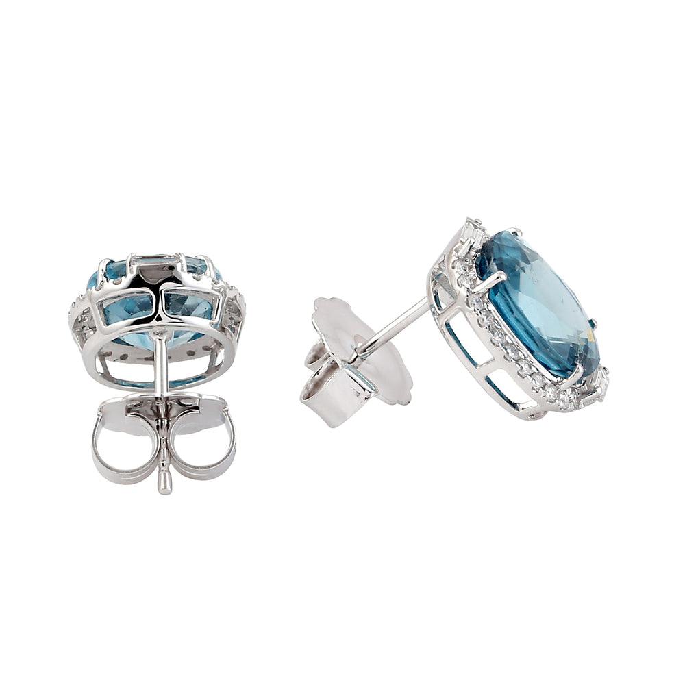 Oval Blue Zirconia & Diamond Halo Stud Earrings in 18K White Gold