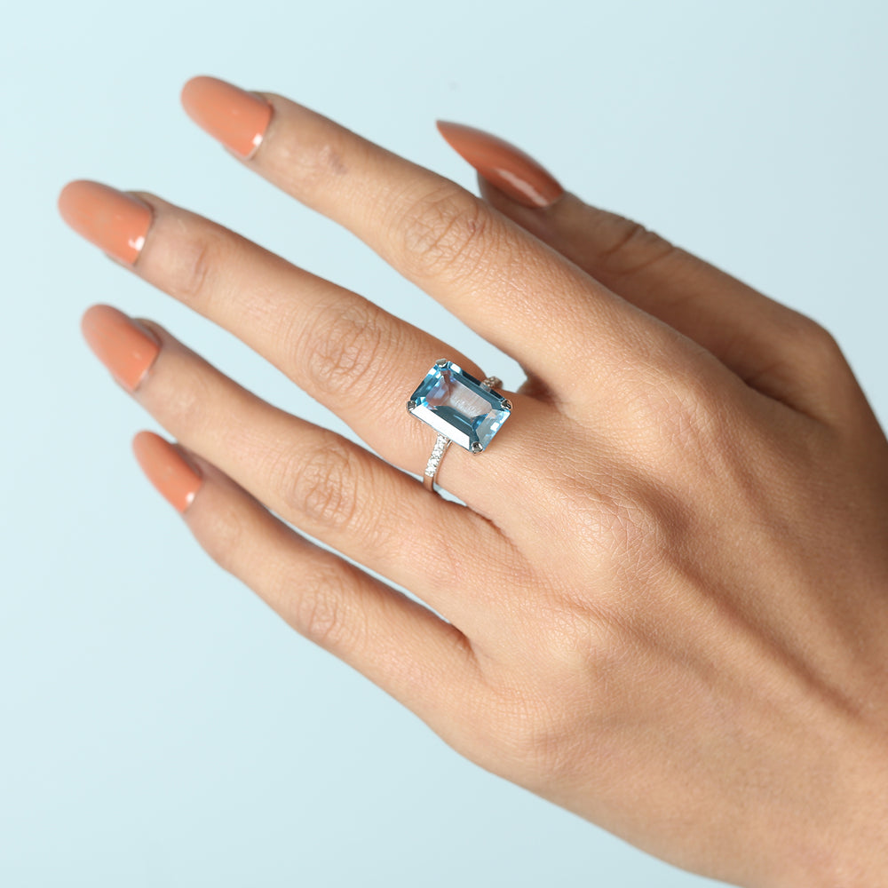 Emerald Cut Blue Topaz Pave Diamond In 18K White Gold Solitaire Ring