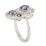 Round Tanzanite December Birthstone Pave Diamond Flower Ring in 18k White Gold